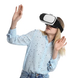 Young woman using virtual reality headset on white background