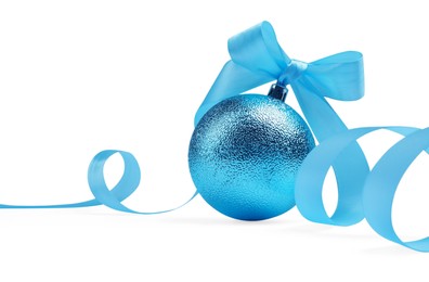 Photo of Beautiful light blue Christmas ball with ribbon isolated on white