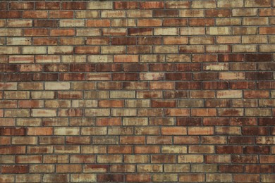 Texture of brown brick wall as background