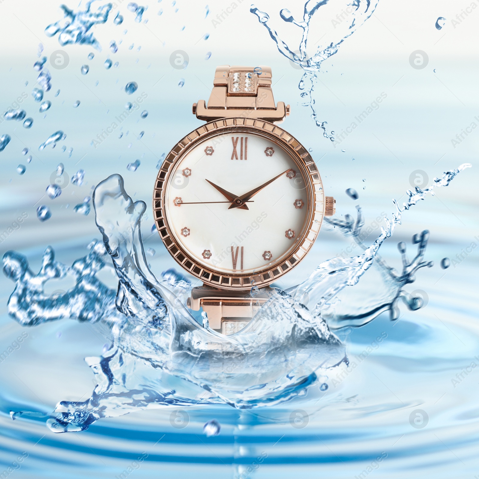 Image of Luxury women's watch in water splashes demonstrating its waterproof