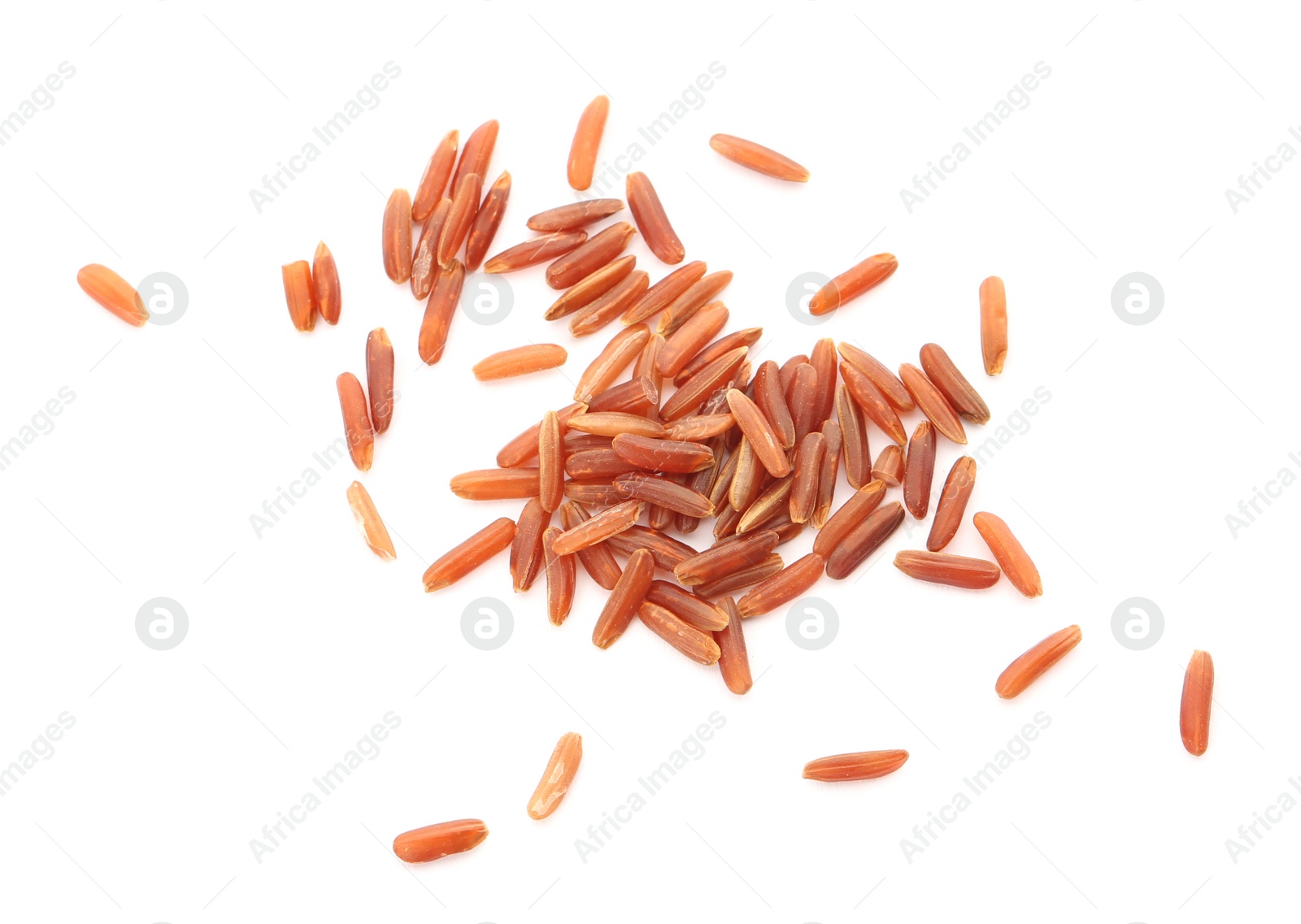 Photo of Uncooked red rice on white background, top view