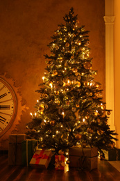 Photo of Festive room interior with beautiful Christmas tree