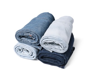 Image of Different stylish rolled jeans isolated on white