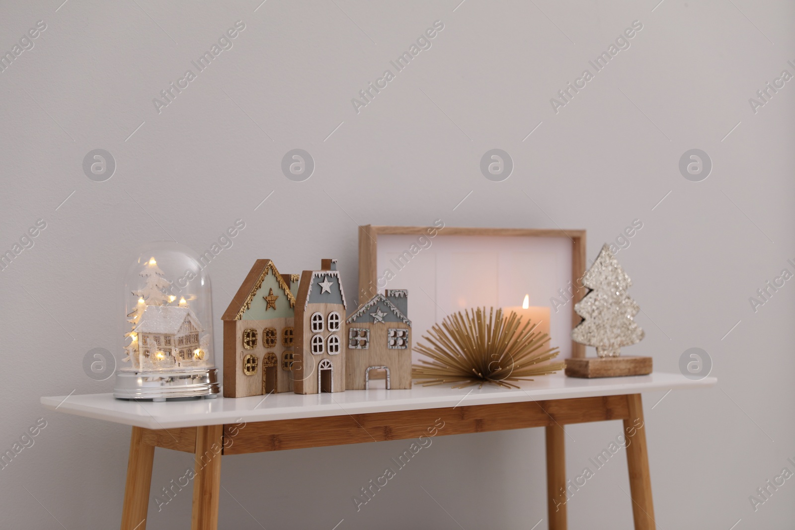 Photo of Modern room interior with table near light wall