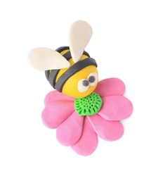 Photo of Bee with flower made from plasticine on white background. Children's handmade ideas
