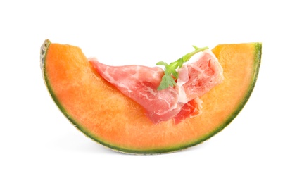 Photo of Slice of fresh melon with prosciutto and arugula on white background