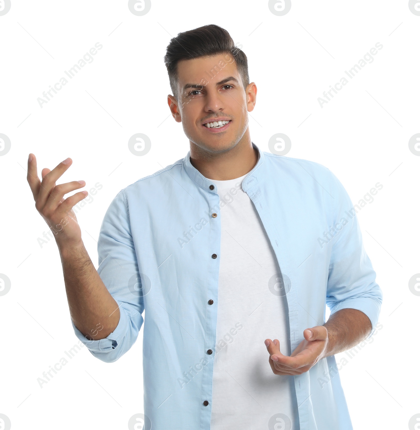 Photo of Man in casual clothes talking on white background