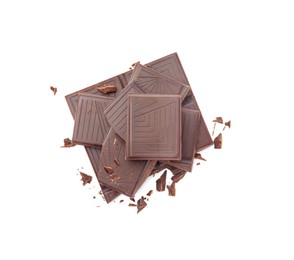 Pieces of delicious dark chocolate bar on white background, top view