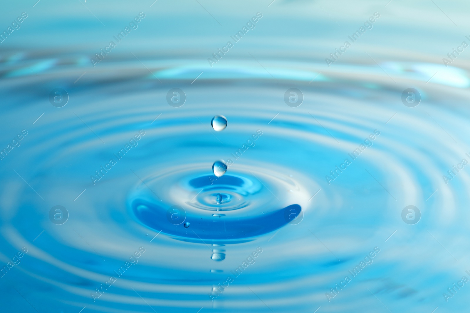 Photo of Splash of clear water with drops as background, closeup