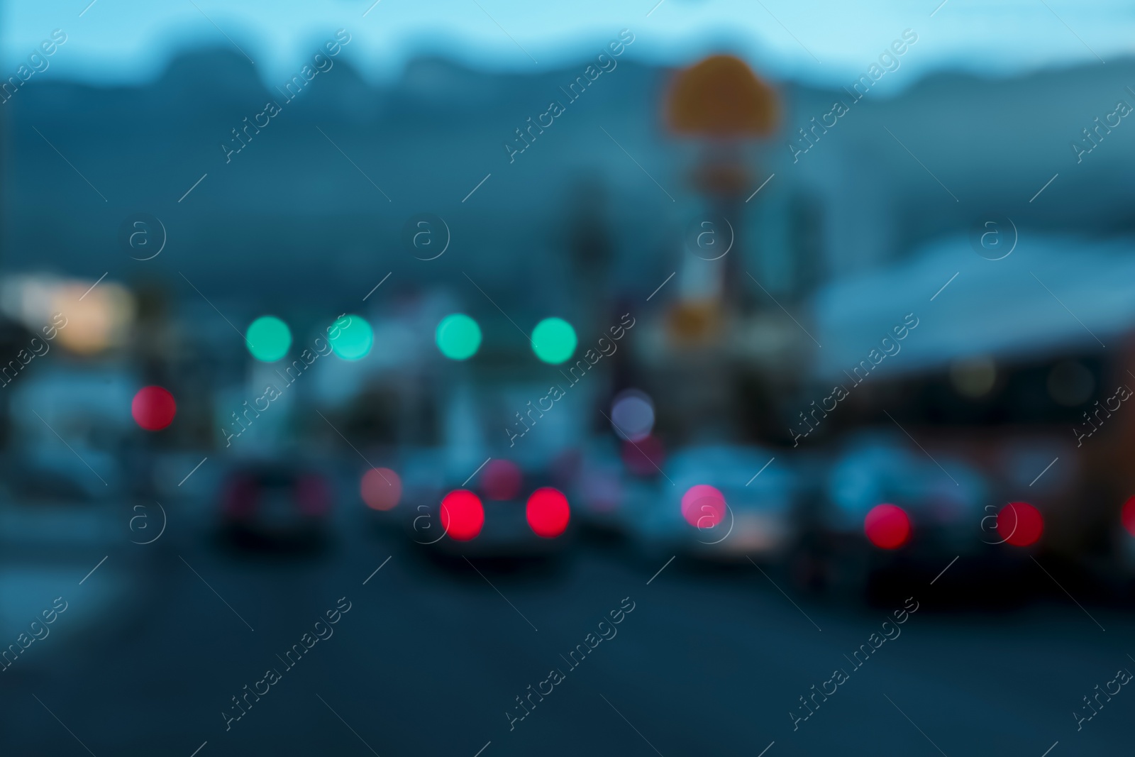 Photo of Blurred view of road with cars, bokeh effect