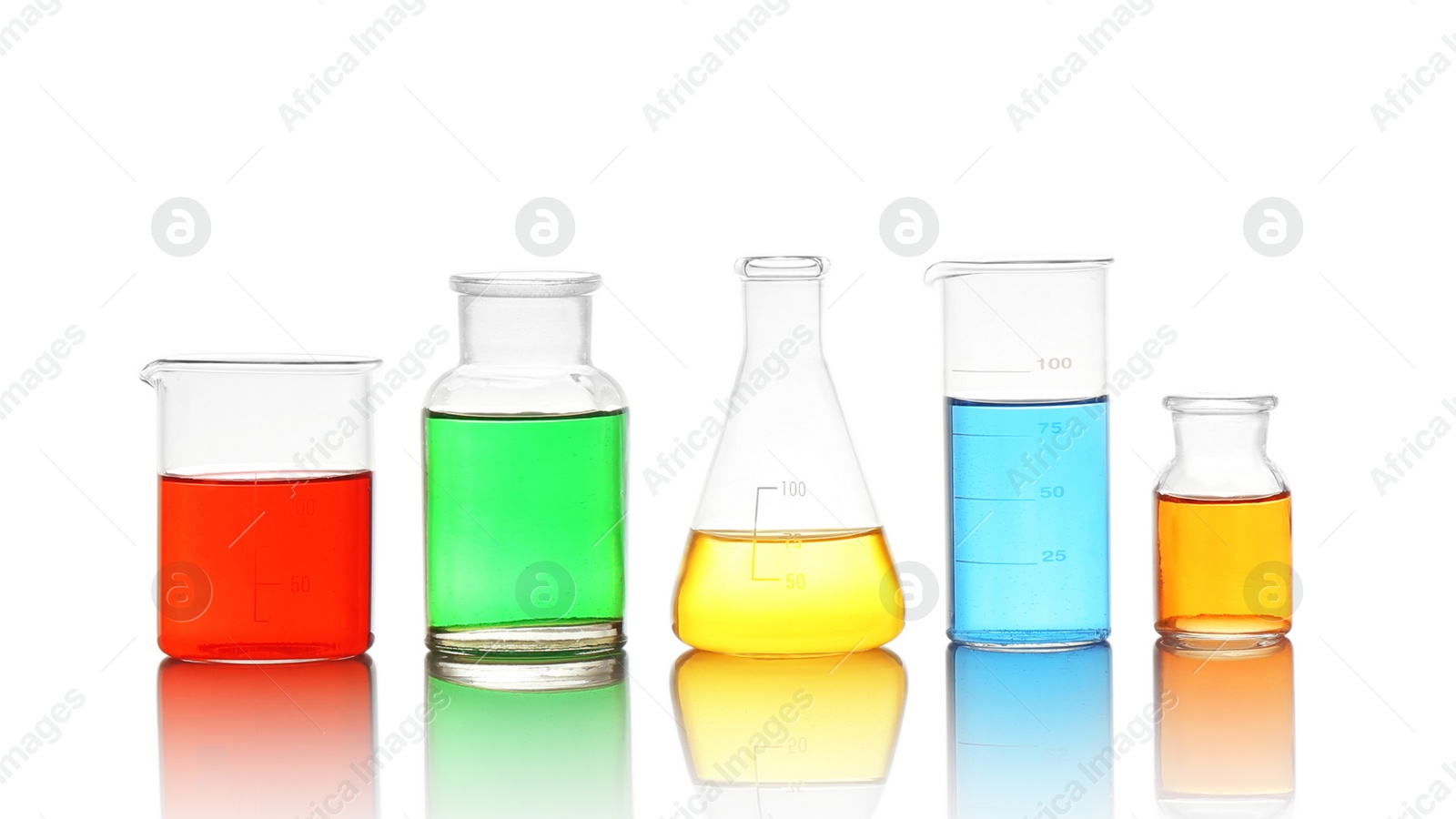 Photo of Different laboratory glassware with colorful liquids isolated on white
