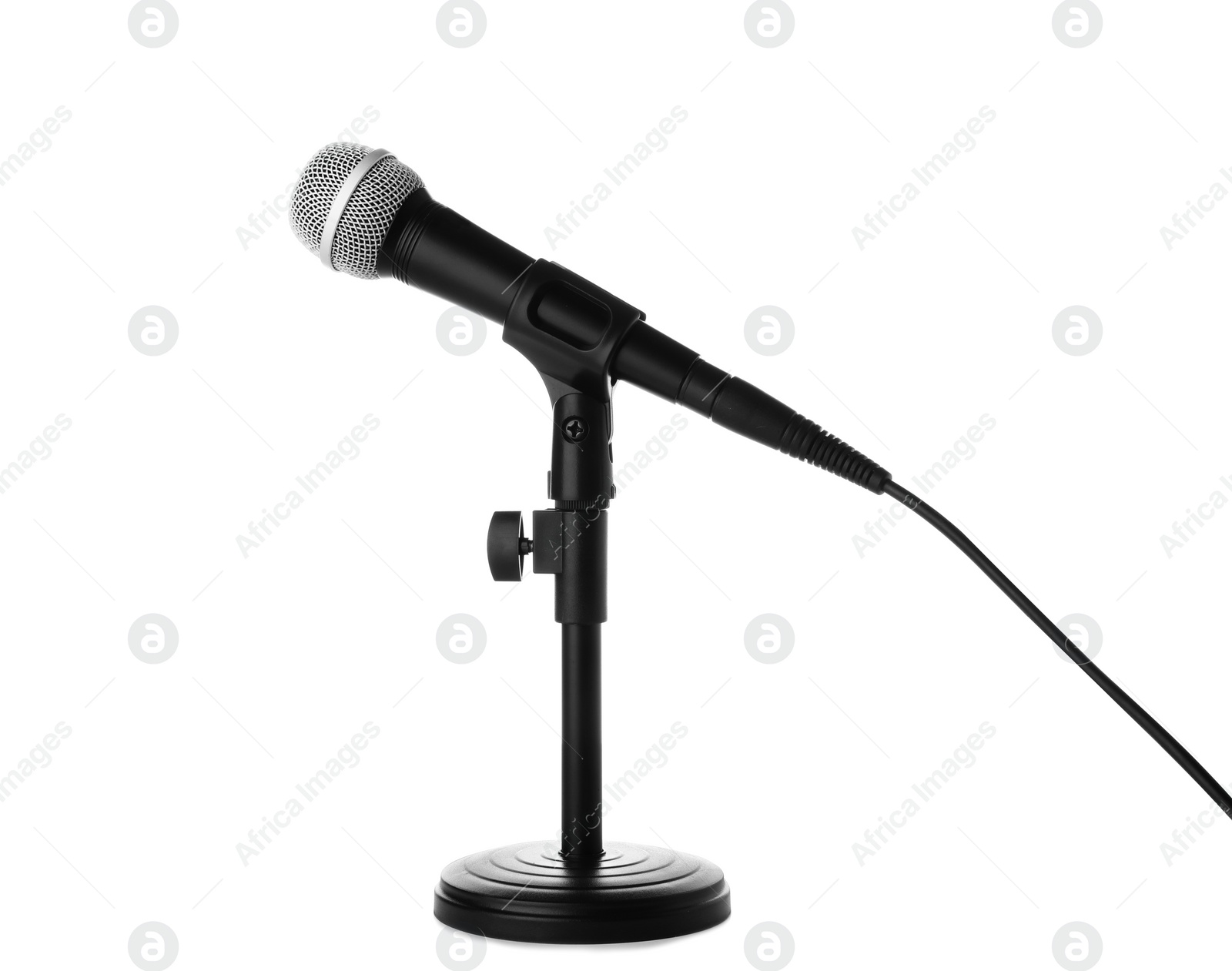 Photo of Dynamic microphone on white background. Professional audio equipment