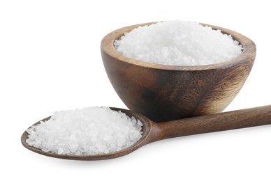 Photo of Natural salt in wooden bowl and spoon isolated on white