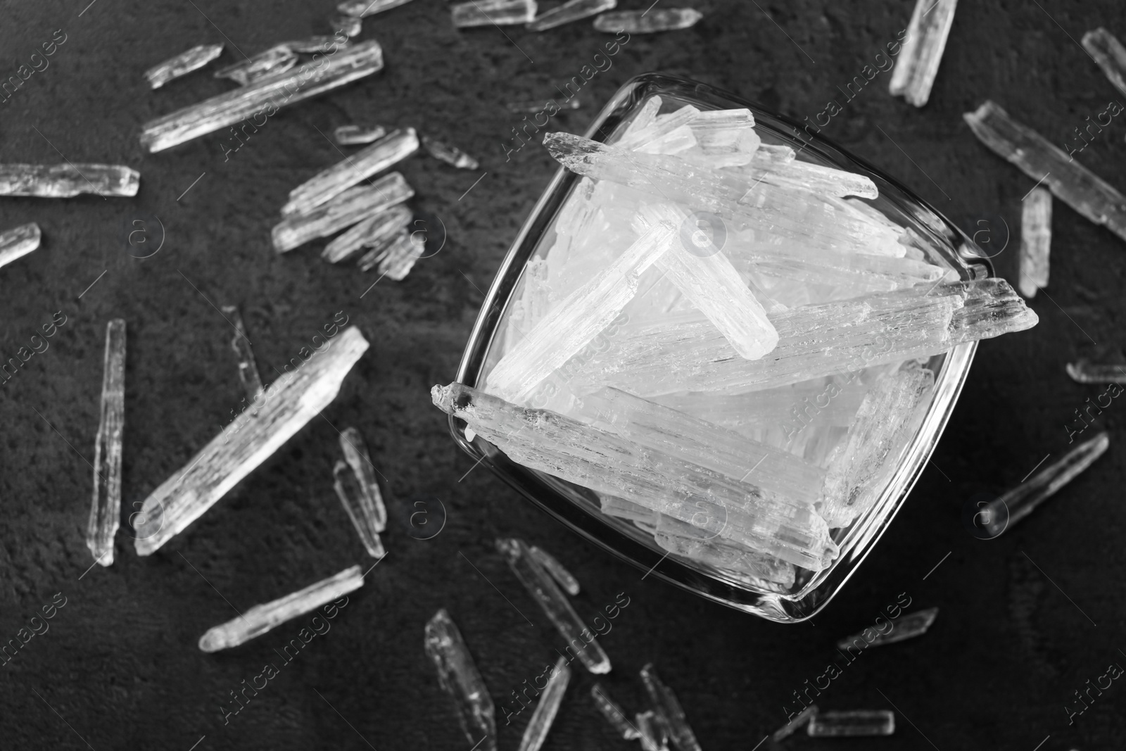 Photo of Menthol crystals on grey background, flat lay