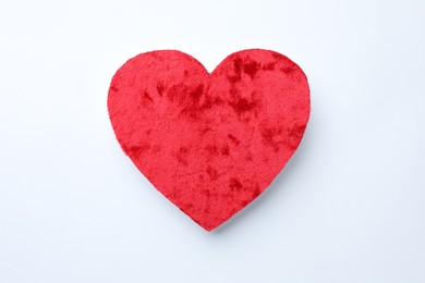 Photo of One velvet heart on white background, top view