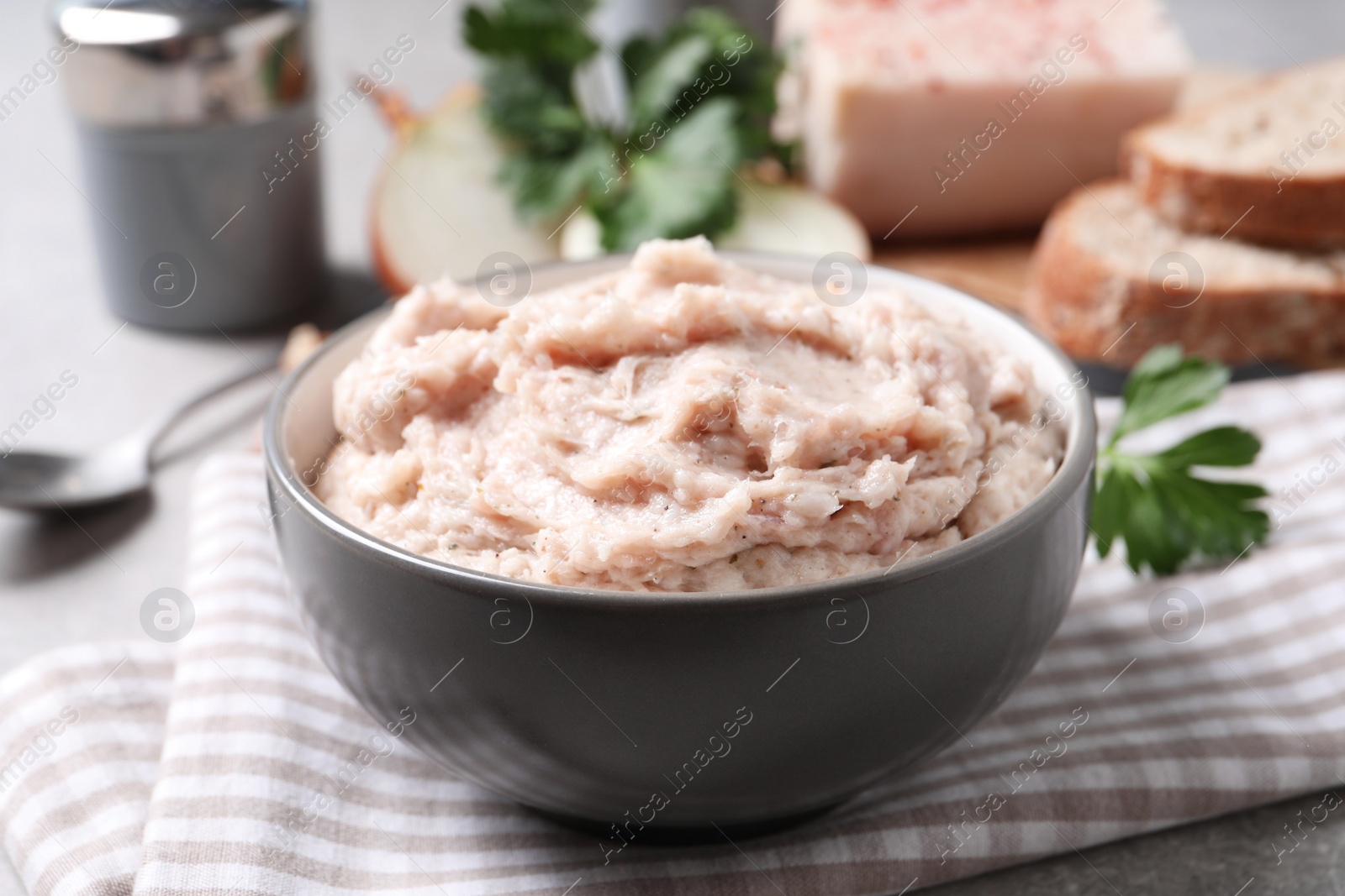 Photo of Delicious lard spread in bowl on table