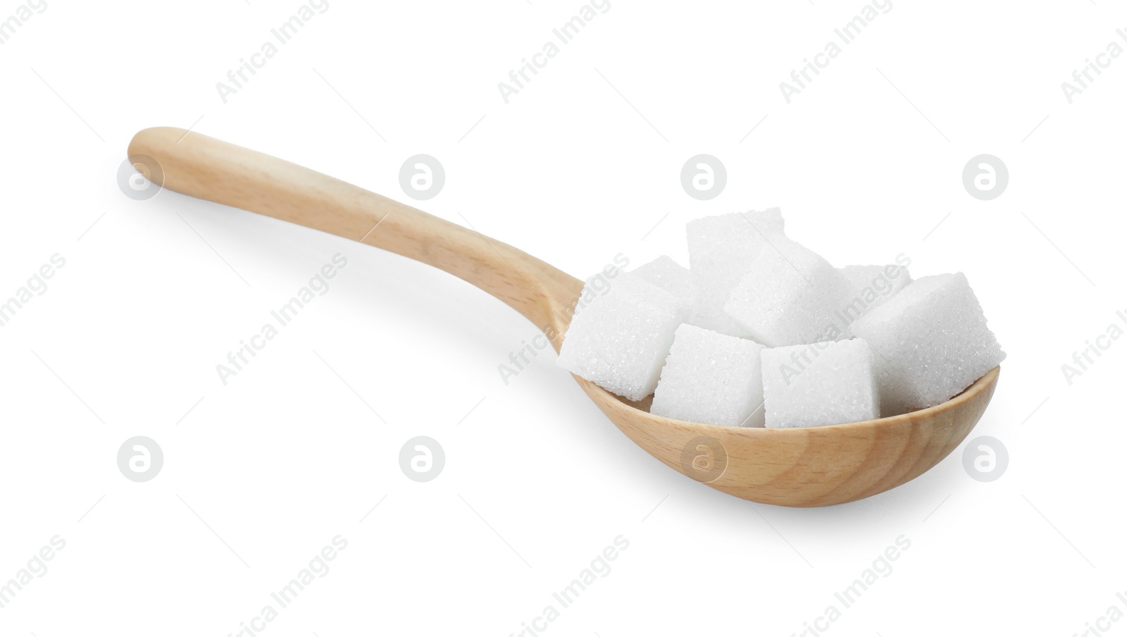 Photo of Sugar cubes in wooden spoon isolated on white