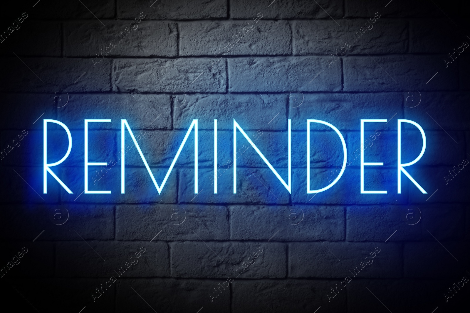 Image of Word REMINDER against brick background. Don't forget 