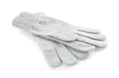 Photo of Pair of woolen gloves on white background. Winter clothes