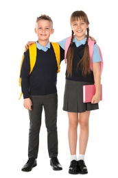 Photo of Full length portrait of cute children in school uniform on white background