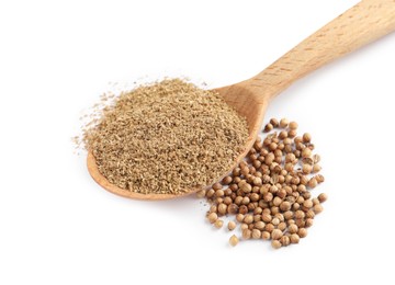 Wooden spoon with powdered coriander and corns on white background