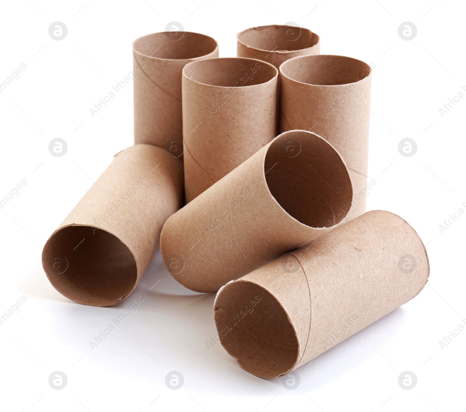 Photo of Empty paper toilet rolls on white background