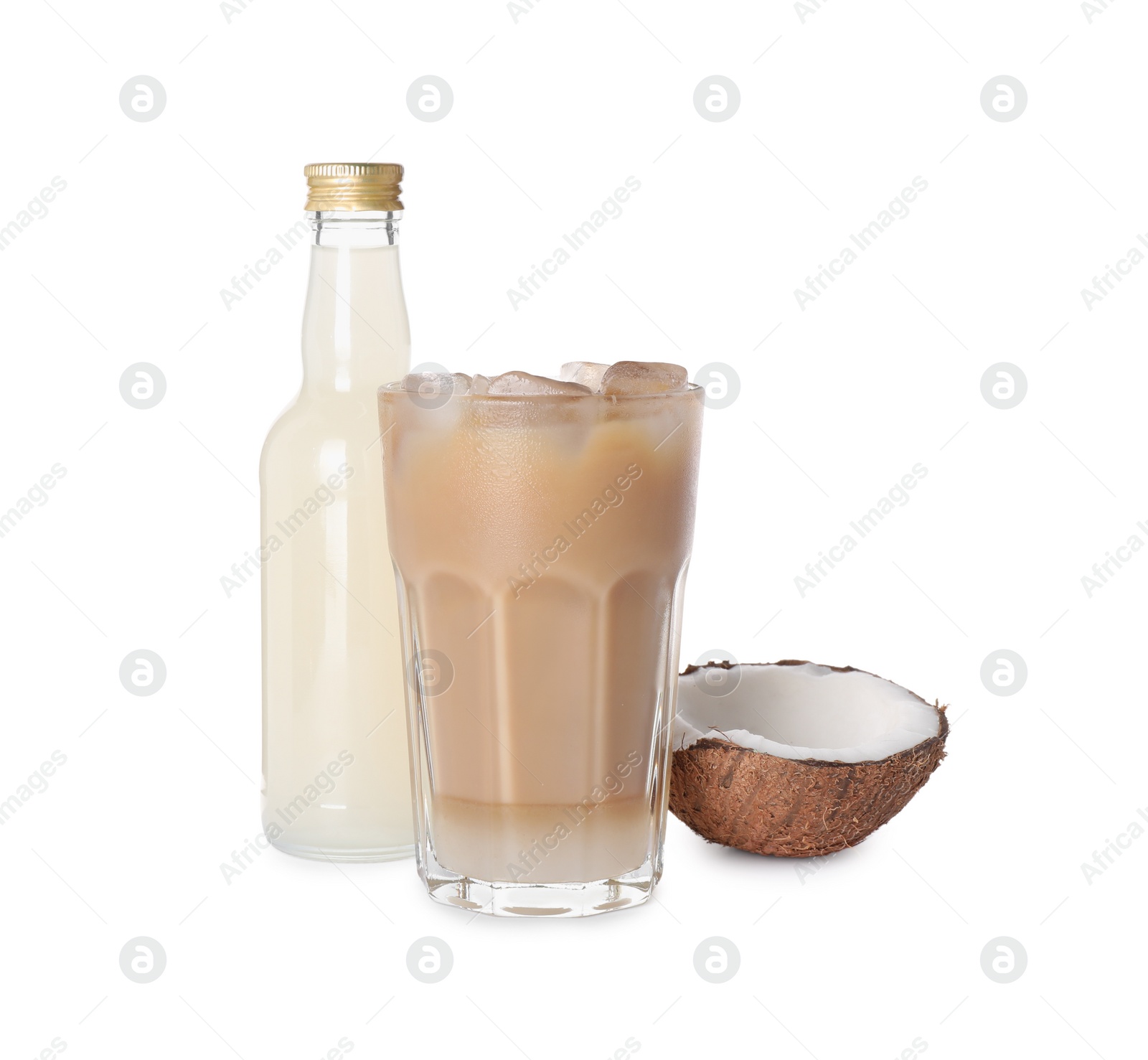 Photo of Bottle of delicious syrup, glass of iced coffee and coconut isolated on white