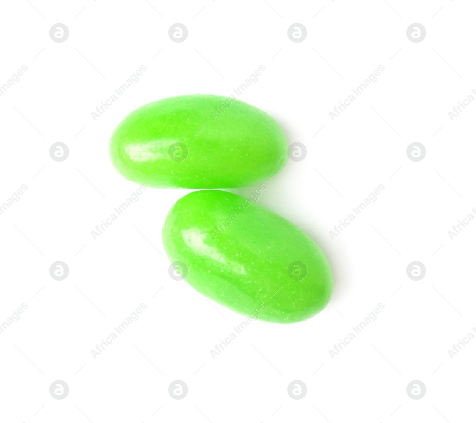 Photo of Tasty bright jelly beans isolated on white, top view