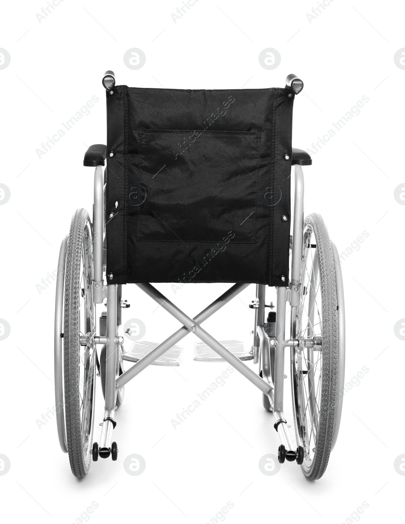 Photo of New modern empty wheelchair on white background