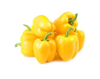 Photo of Ripe yellow bell peppers isolated on white