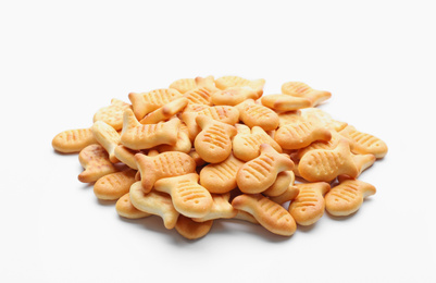 Photo of Delicious crispy goldfish crackers on white background