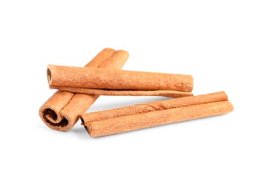 Three aromatic cinnamon sticks isolated on white