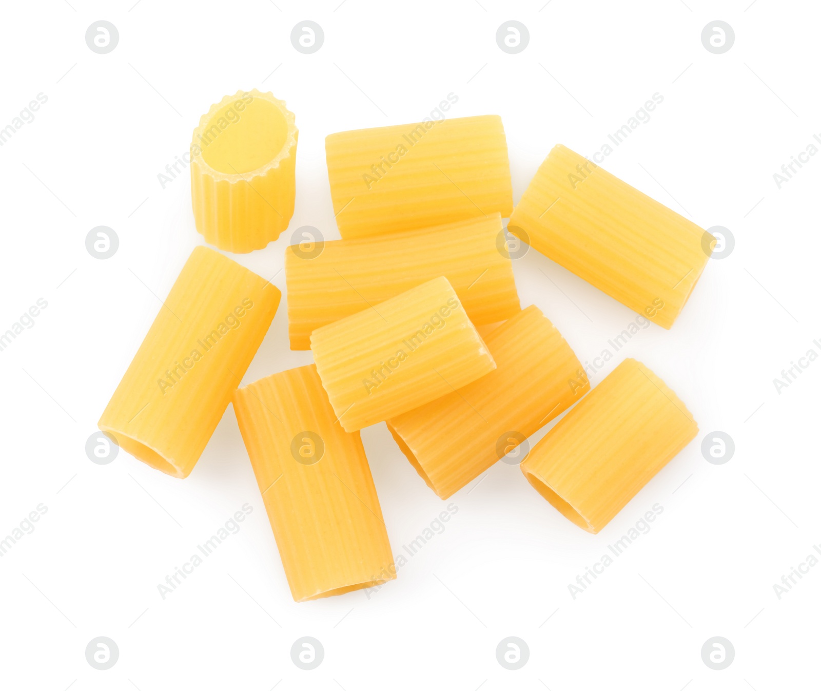 Photo of Pile of raw rigatoni pasta isolated on white, top view