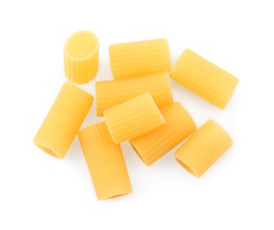 Photo of Pile of raw rigatoni pasta isolated on white, top view