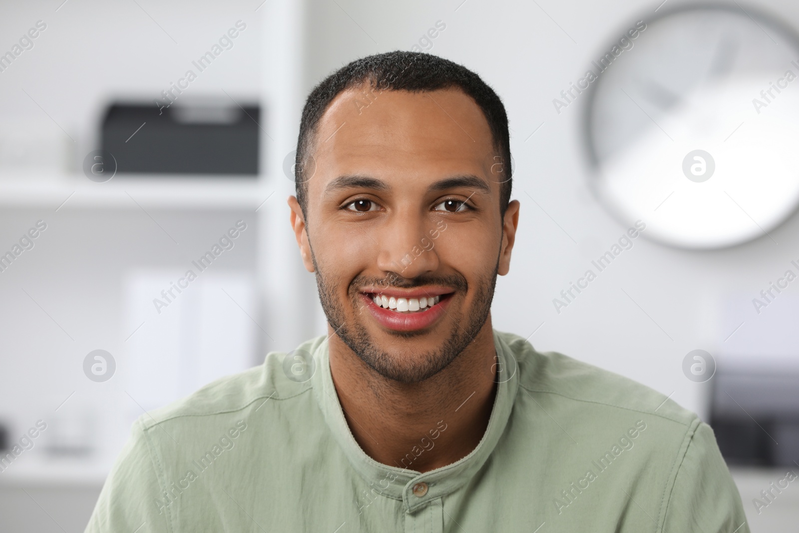 Photo of Portrait of handsome young man at home