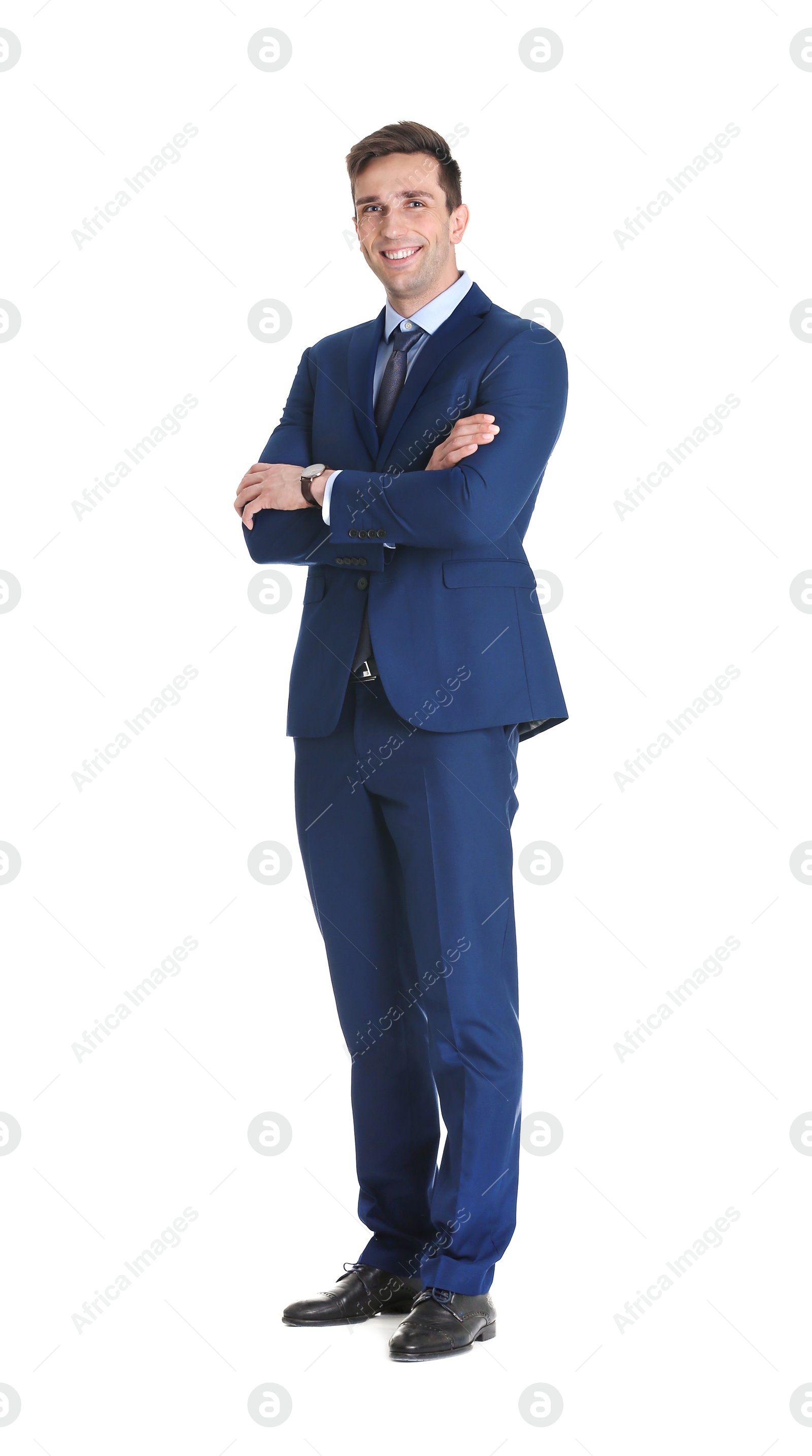 Photo of Handsome young man in suit on white background