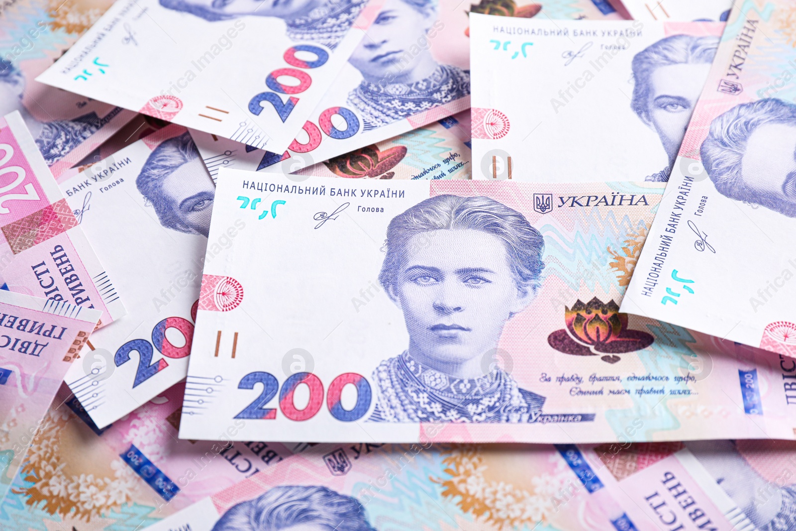 Photo of Closeup view of Ukrainian money as background. National currency