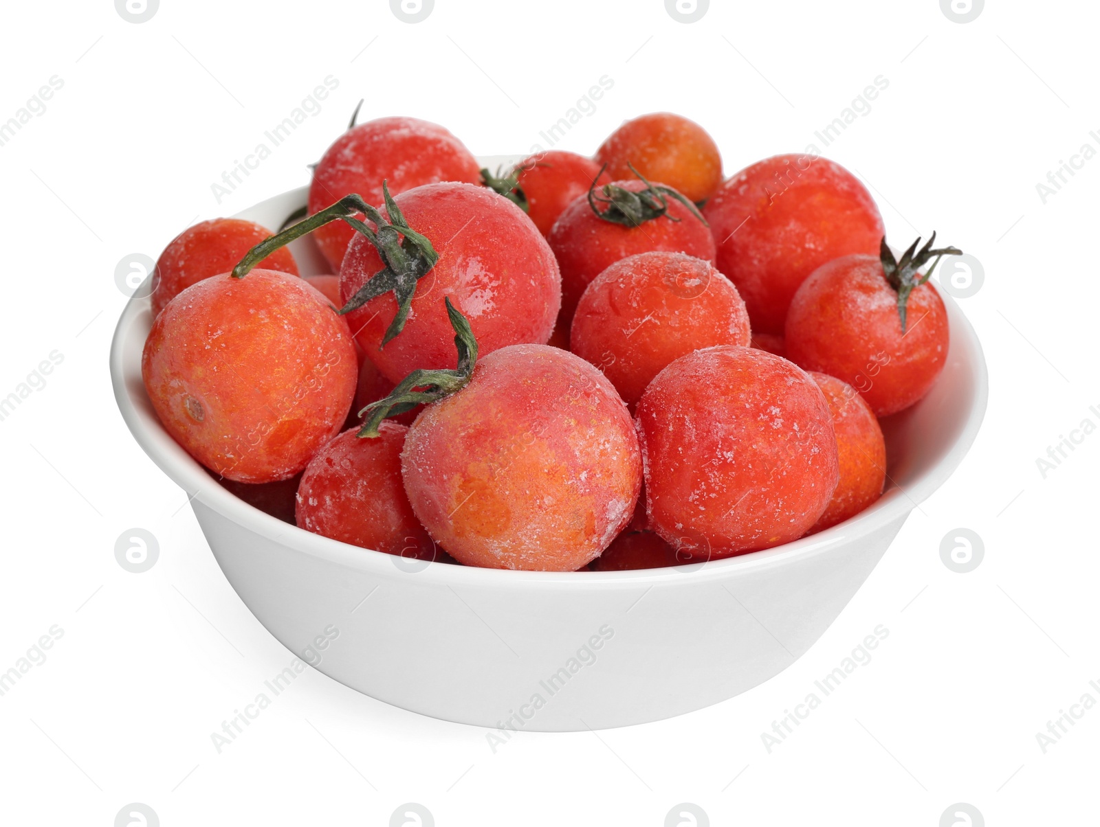 Photo of Frozen tomatoes in bowl isolated on white. Vegetable preservation