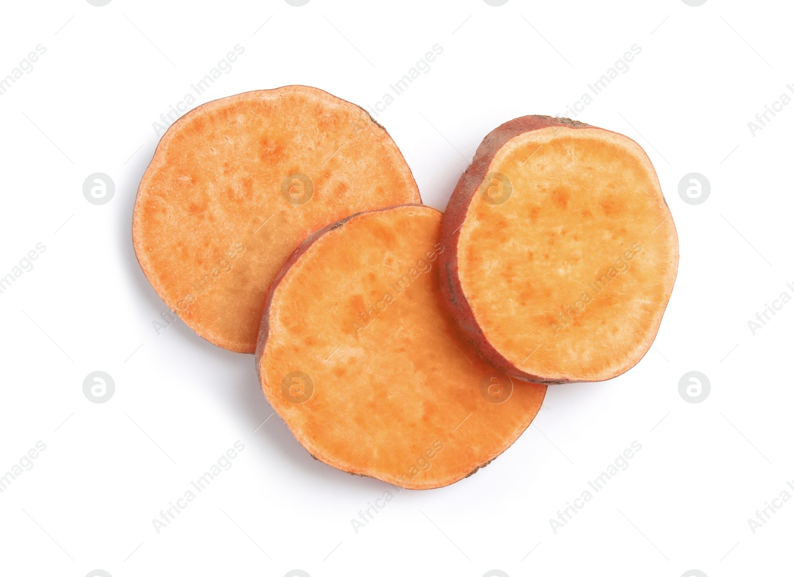 Photo of Slices of ripe sweet potato on white background, top view