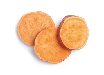 Photo of Slices of ripe sweet potato on white background, top view