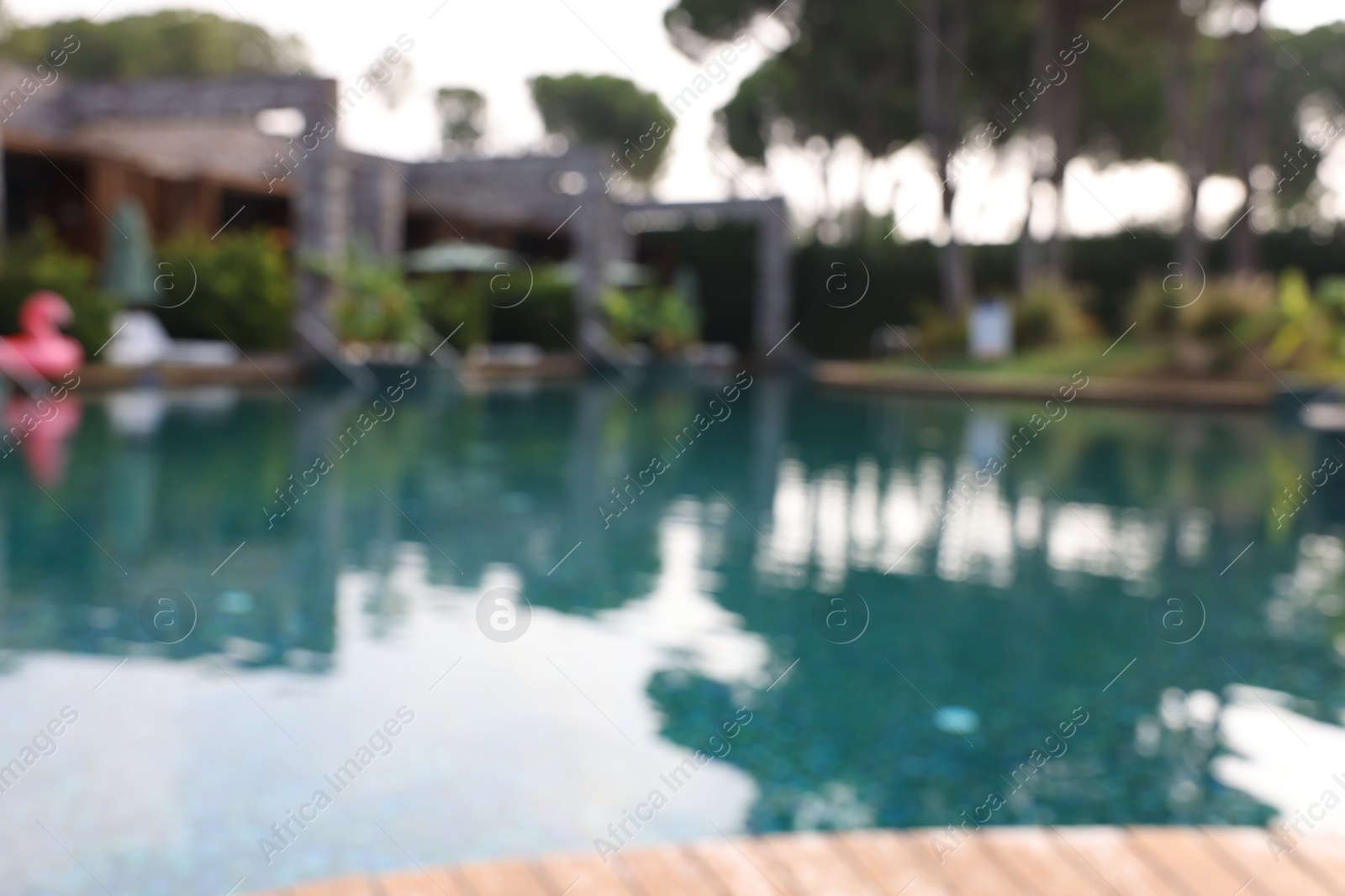 Photo of Blurred view of outdoor swimming pool at luxury resort