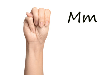 Woman showing letter M on white background, closeup. Sign language