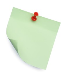 Photo of Blank light green note pinned on white background, top view