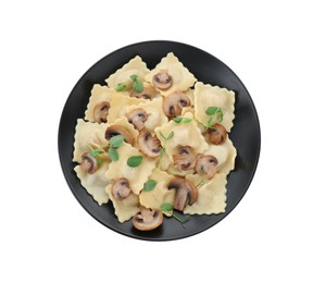 Plate of delicious ravioli with mushrooms isolated on white, top view