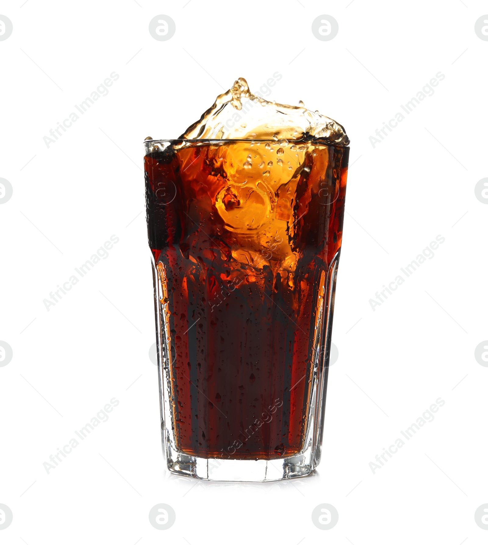 Photo of Splash of cola in glass on white background