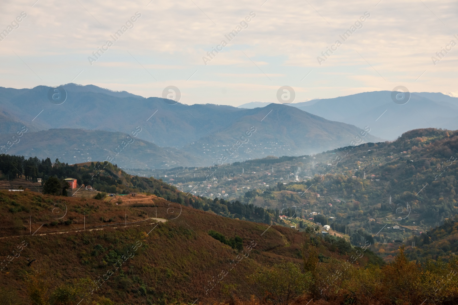 Photo of Picturesque view of beautiful valley with houses in mountains