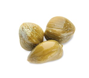 Three delicious pickled capers on white background, top view