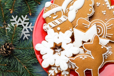 Delicious Christmas cookies on blue wooden table, closeup