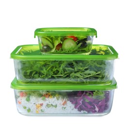 Photo of Glass containers with fresh food on white background