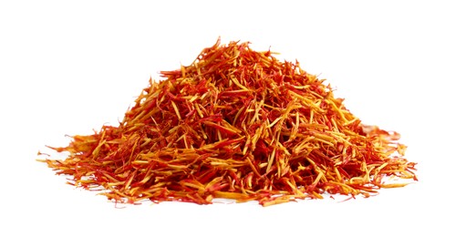 Photo of Pile of dried color saffron isolated on white